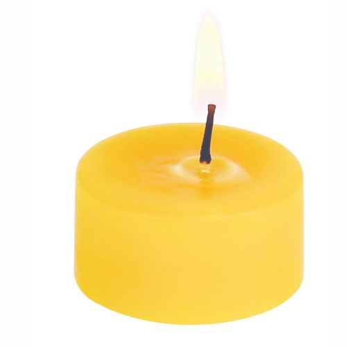 angezündetes Teelicht aus Bienenwachs 