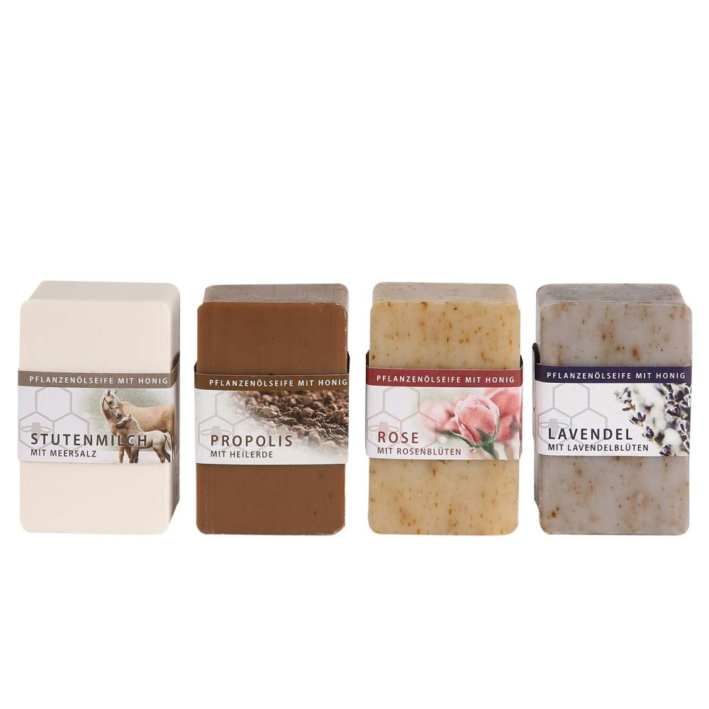 Seifenblöcke nebeneinander aufgereiht mit Banderole