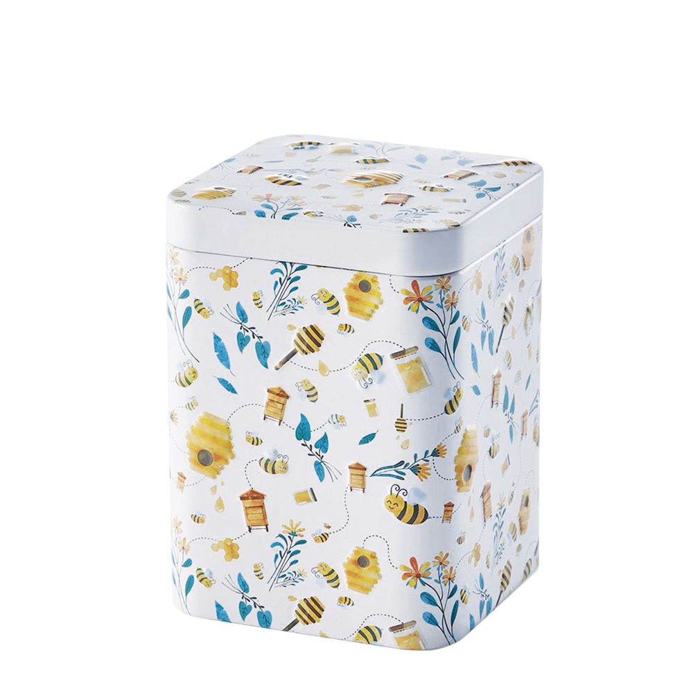 Weiße Teedose mit freundlichen Motiven